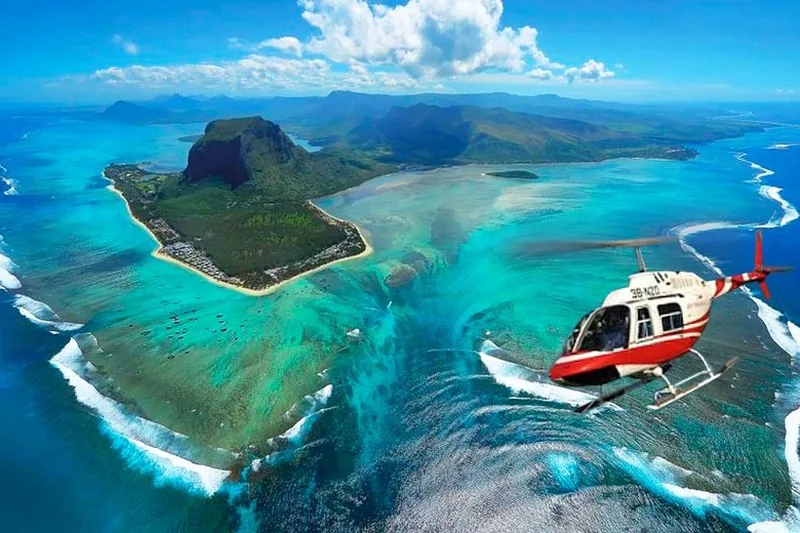 Helicopter over underwater waterfall Mauritius