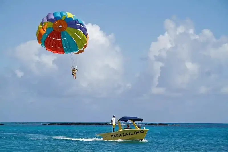 Parasailing over Mauritius lagoon
